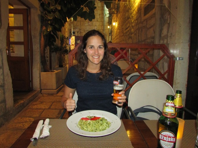 Eating pasta in an alleyway in Korcula's town centre at Amfora Pizzeria